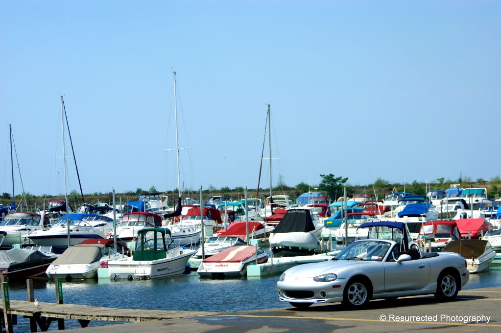 http://i1247.photobucket.com/albums/gg629/ResurrectedPhoto/Motors/Miata%20Shoot/Miata1-1.jpg