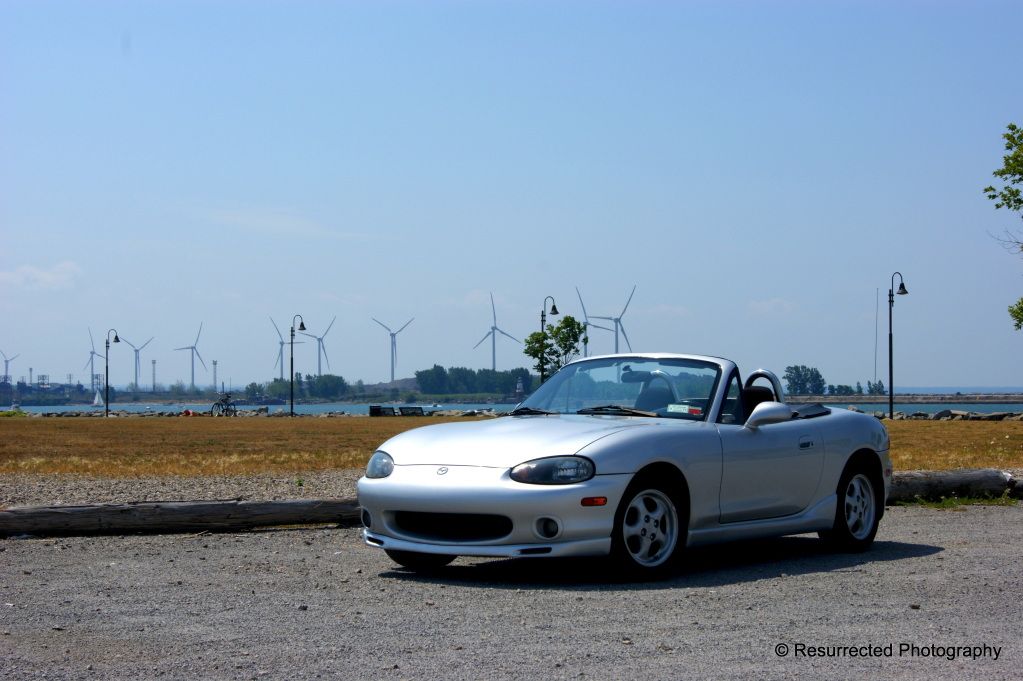 http://i1247.photobucket.com/albums/gg629/ResurrectedPhoto/Motors/Miata%20Shoot/Miata6-1.jpg